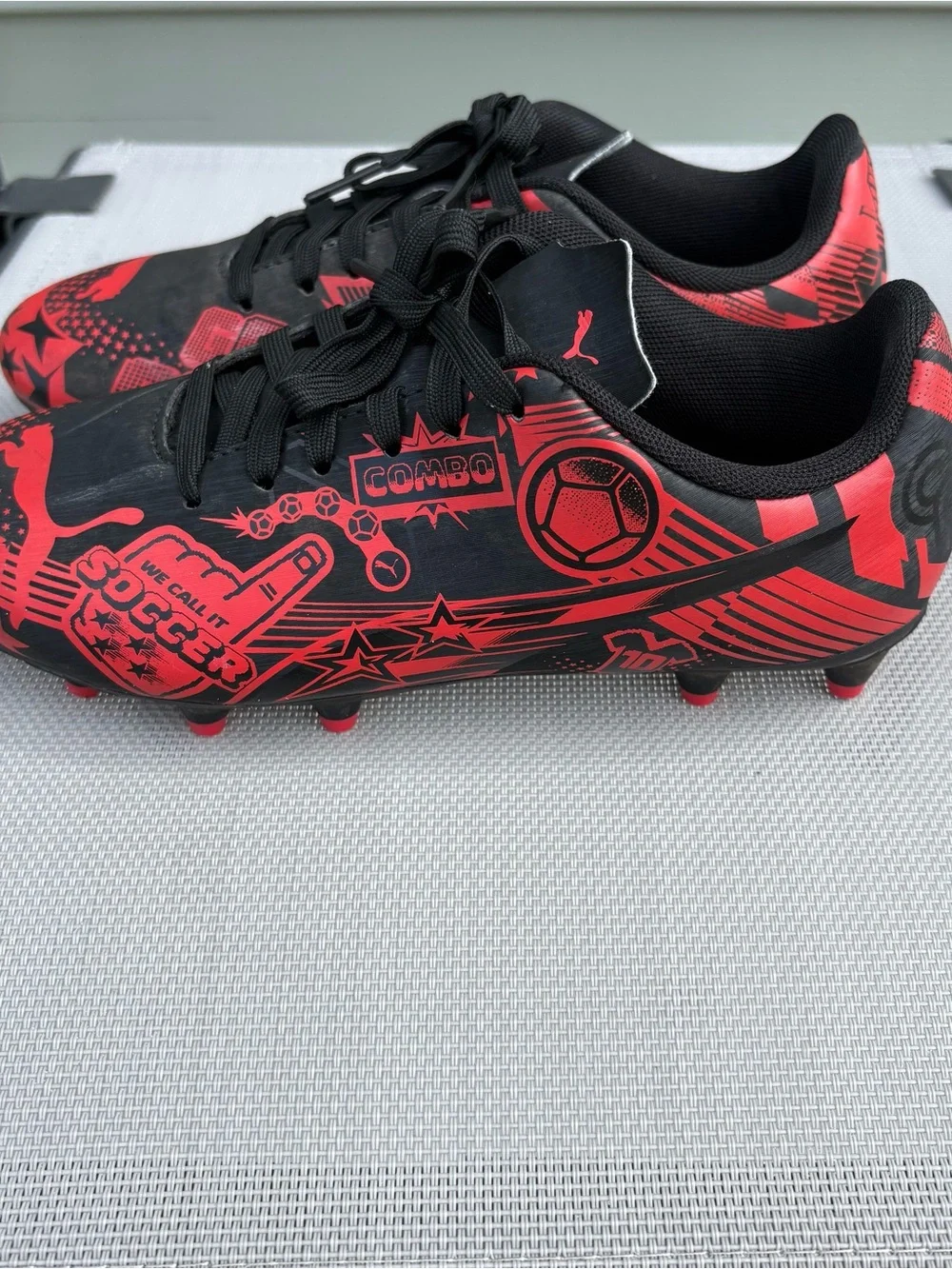Kids Black and Red Soccer Cleats - Youth Athletic Shoes